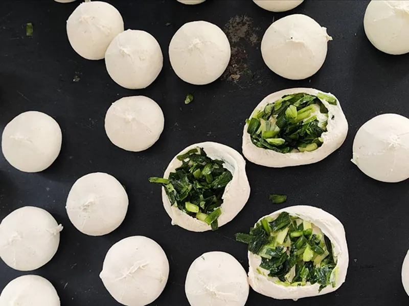 Llenador de masa para una fábrica de alimentos vietnamitas